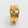 gold solitaire couple ring