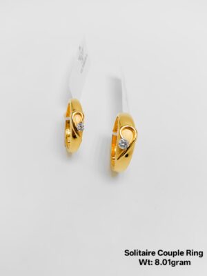 gold solitaire couple ring