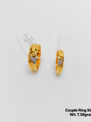 gold solitaire couple ring