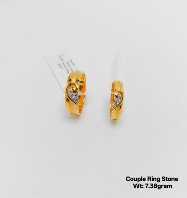 gold solitaire couple ring